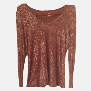 A New Approach Brick Red With Gold Flakes Top.